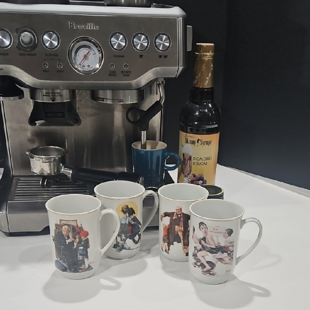 Set of 4 Norman Rockwell coffee mugs